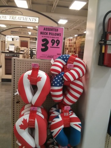 Neck pillows that are decorated with American or Canadian flags