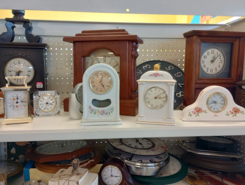 A bunch of decorative small clocks like you'd put on a shelf. 